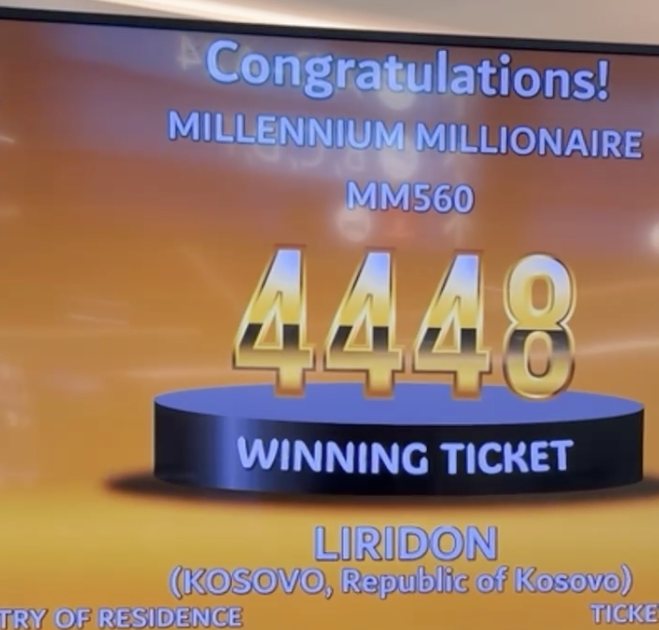 ドバイ・デューティー・フリーの抽選会場の画面。MILLENNIUM MILLIONAIRE MM560、WINNING TICKET 4448、LIRIDON (KOSOVO, Republic of Kosovo) と表示されている